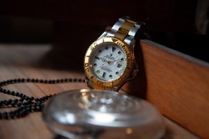 silver and gold rolex watch