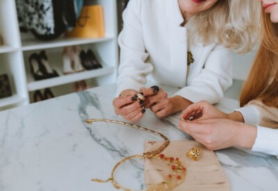 Inherited jewelry pieces, including vintage rings and necklaces, symbolizing the option to sell family heirlooms that don't match personal style at Diamond Banc.