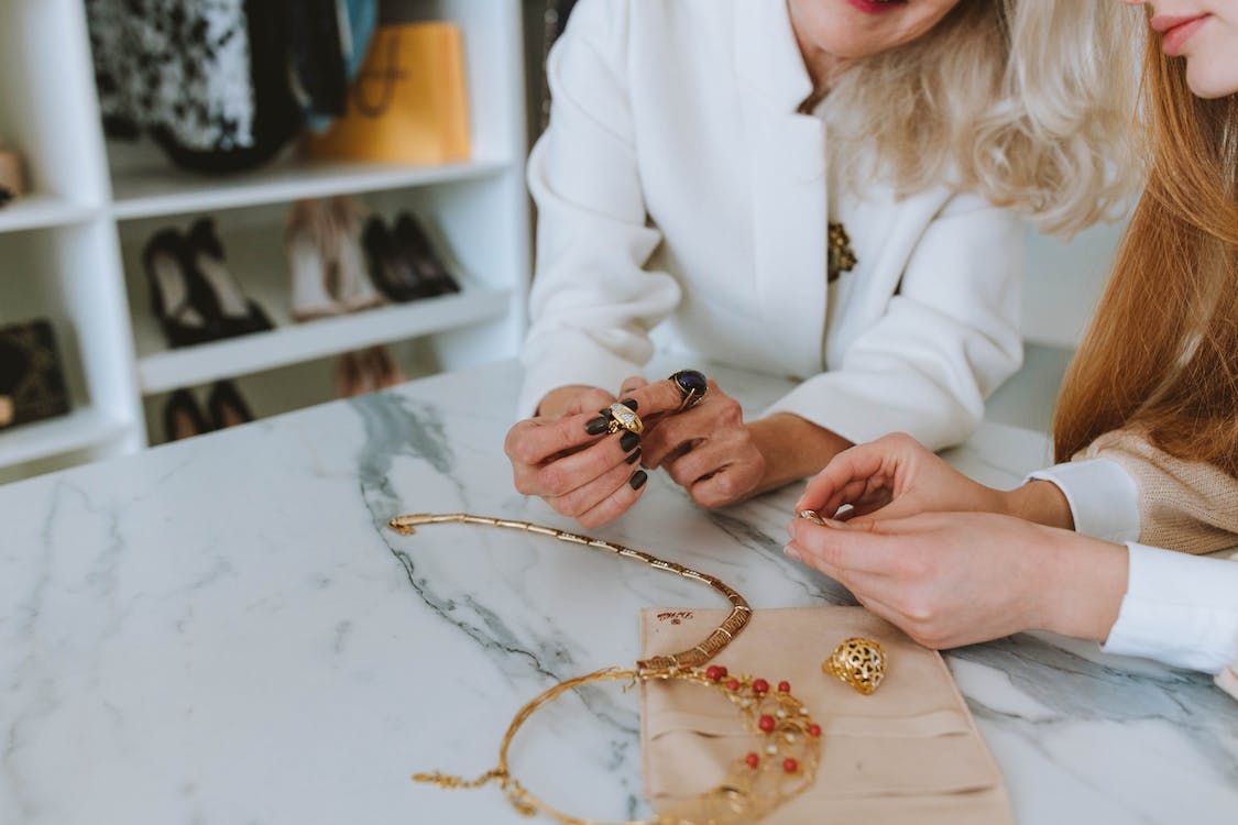 Inherited jewelry pieces, including vintage rings and necklaces, symbolizing the option to sell family heirlooms that don't match personal style at Diamond Banc.