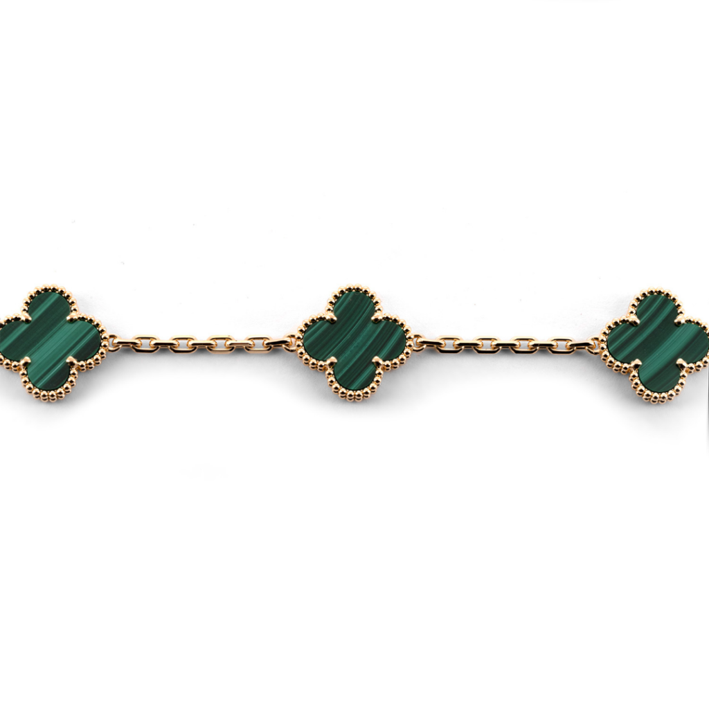 Van Cleef & Arpels Alhambra bracelet with green malachite clover motifs, perfect for those looking to sell your Van Cleef jewelry in St. Louis